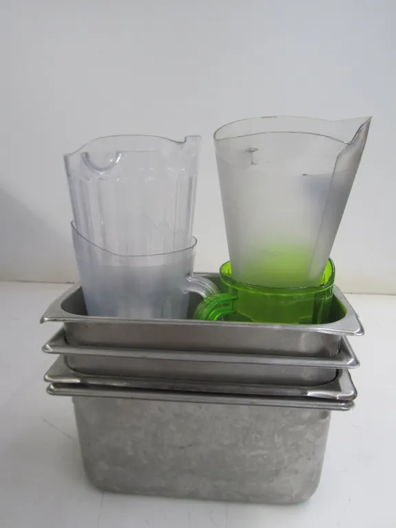 (4) 1/3 Size Stainless Steel Steam Table Pans And (4) Plastic Pitchers