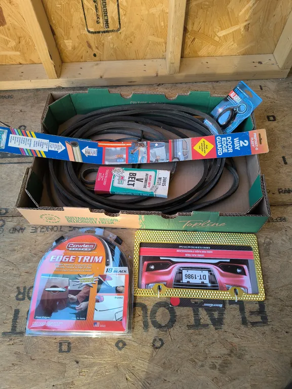 Automotive Lot: Cowles Custom Edge Trim, License Plate Frame, V-Belt, Door Guards & Alarm
