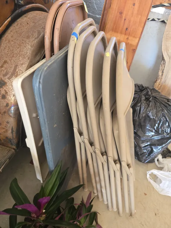 Assorted steel folding chairs and card tables