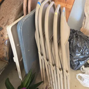 Assorted steel folding chairs and card tables