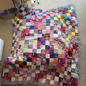 Primitive style twin size patchwork tie knot quilt