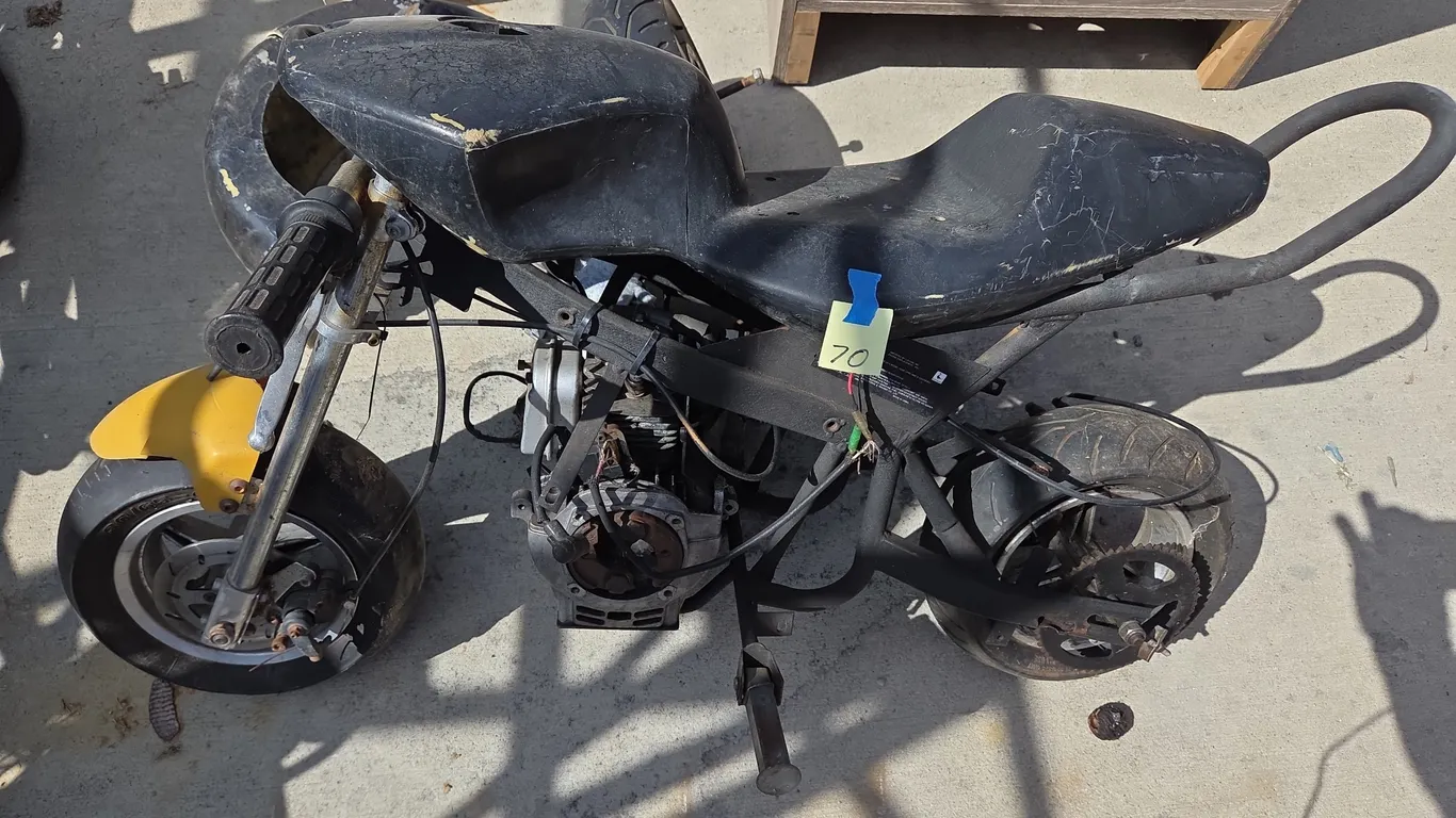 Mini motorcycle and assorted parts