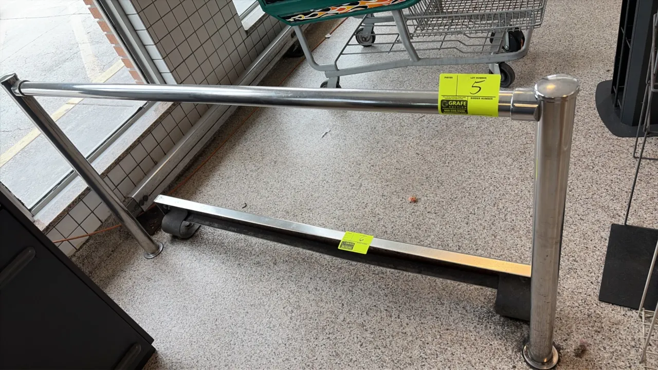 Chrome guide rail. Features tubular metal construction with two vertical stanchion posts. 5'L. Floor-mounted base flanges.