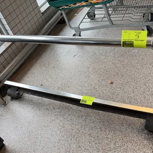 Chrome guide rail. Features tubular metal construction with two vertical stanchion posts. 5'L. Floor-mounted base flanges.