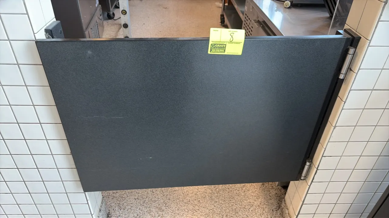 Wood laminate swing door. Features a black textured laminate finish and swinging hinge mounting hardware. 36"W.