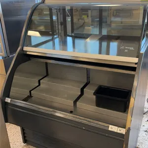 Structural Concepts HUDLR3852R.5520 self-contained refrigerated display case. Features an upper curved glass service section with rear sliding doors a