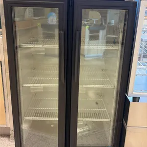True GDM-14RF-LD reach-in beverage cooler merchandiser. Features curved double glass doors, illuminated top sign panel, adjustable wire shelving, and 