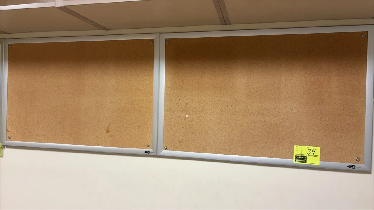 Quartet cork bulletin boards. Features natural cork tack surfaces with silver-tone aluminum frames. Wall-mounted design.