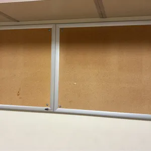 Quartet cork bulletin boards. Features natural cork tack surfaces with silver-tone aluminum frames. Wall-mounted design.