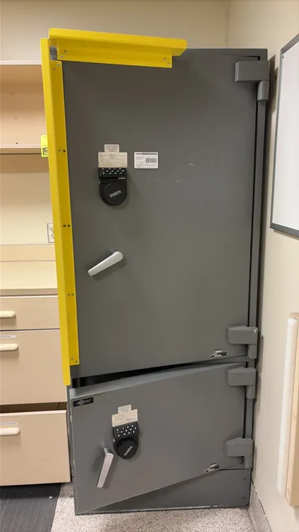 AMSEC 2-door digital safe. Features dual compartments with Kaba digital electronic keypad locks, heavy-duty exterior hinges, adjustable interior shelv
