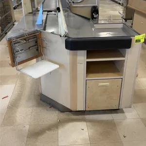 12' single belt checkout lane. Features stainless steel tops, motorized conveyor belt section, bagging platform with wire bag rack, terminal mounting 