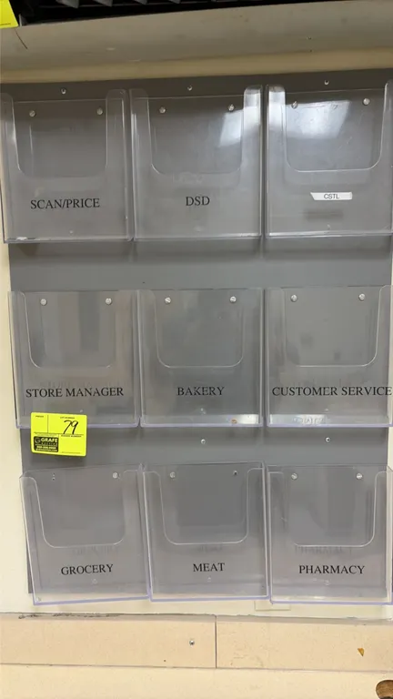 Wall-mounted poly paper racks. Includes a 9-pocket document organizer and a 3-pocket vertical document organizer. Features clear plastic document hold