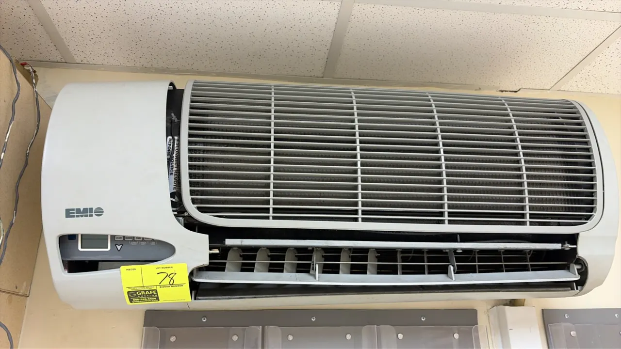 EMI room air conditioner with condenser. Features a wall-mounted indoor evaporator unit with front digital control display and directional louvers.