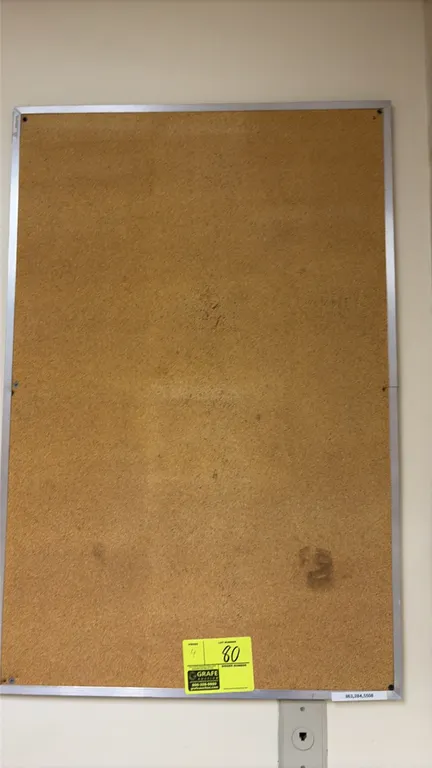 Cork bulletin boards. Features natural cork surfaces with aluminum frames. Includes Quartet and assorted styles in various sizes. Wall-mounted design.