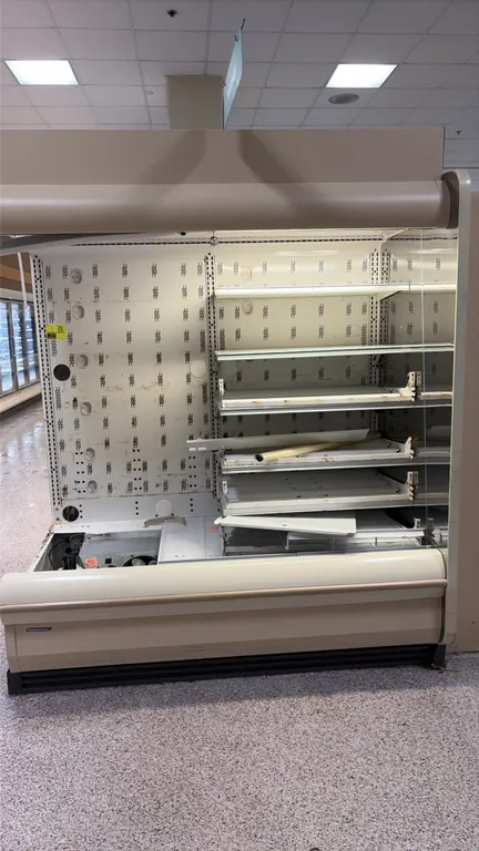 2014 Hillphoenix O5DM6 multi-deck open display case. Features multi-tier shelving and top canopy lighting. 6'L. S/N: 1287522. Electrical: 115/120V, 60