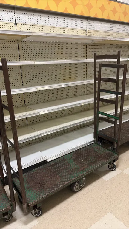 Metal U-boat carts. Features diamond tread plate platform decks and dual tall metal end handles. 4'L. Mounted on 6 casters with a center tilt wheel co