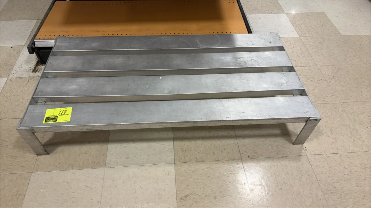 Aluminum dunnage rack. Features welded aluminum construction with a slatted top surface. 4'L.