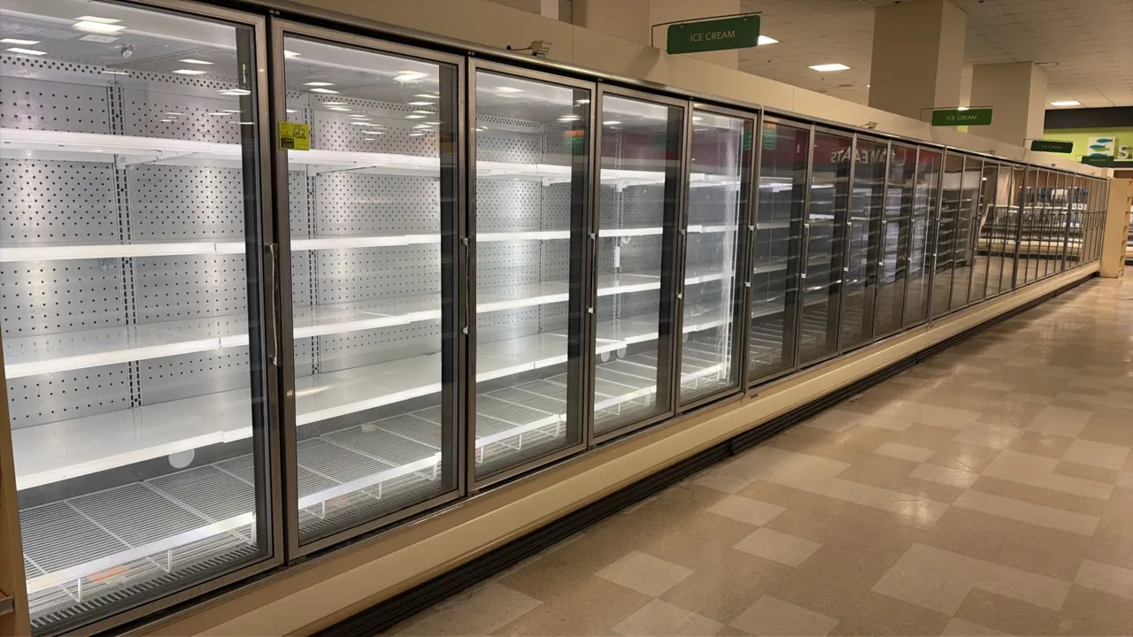 2014 Hillphoenix ORZ5 frozen food glass doors. Features gas defrost, LED interior lighting, adjustable solid shelving, and bottom wire racks. Refriger