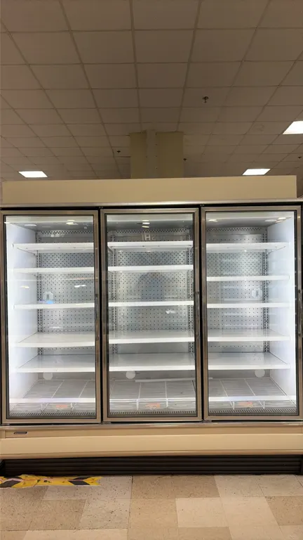2014 Hillphoenix ORZ3 frozen food glass doors. Features LED interior lighting, gas defrost, adjustable shelving, and bottom wire racks. Electrical: 11