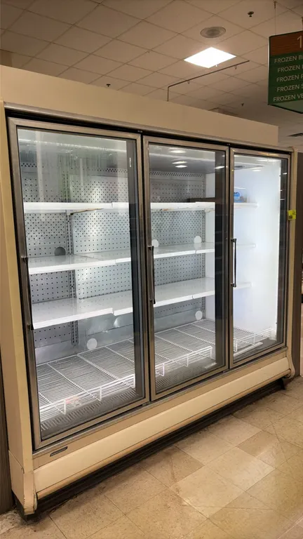 2014 Hillphoenix ORZ3 frozen food glass doors. Features solid adjustable shelving, bottom wire decking, LED interior lighting, and hot gas defrost. S/