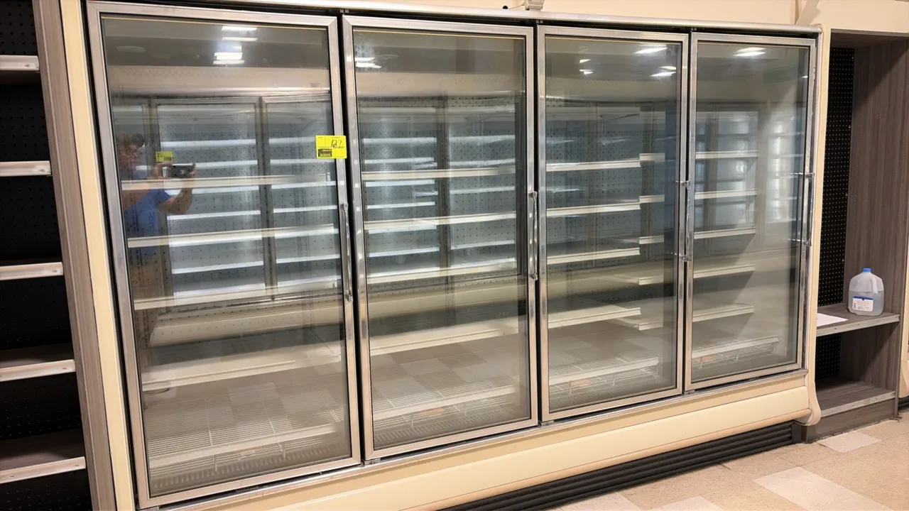 2012 Hillphoenix ORZ4 frozen food glass doors. Features gas defrost, LED interior lighting, adjustable shelving, and bottom wire racks. Refrigerant: R