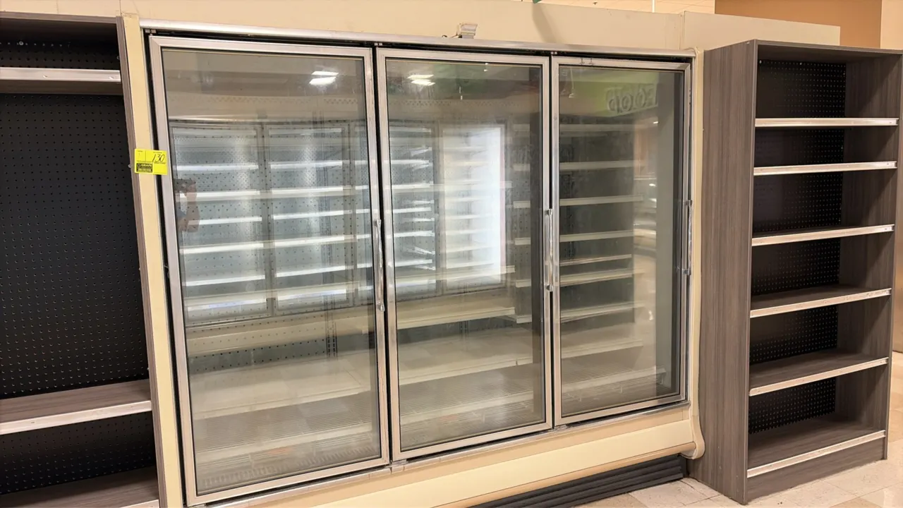 2014 Hillphoenix ORZ3 frozen food glass doors. Features adjustable shelving, bottom wire rack, LED interior lighting, and gas defrost. Electrical: 115