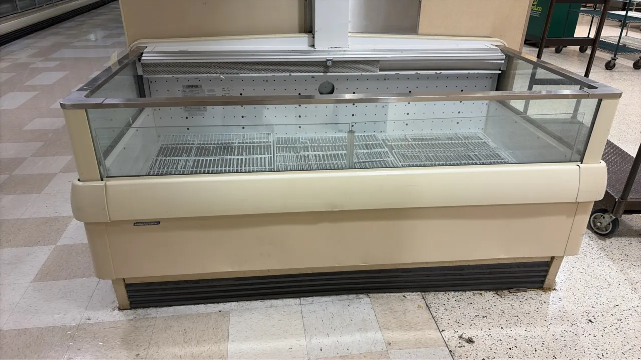 2014 Hillphoenix OWEZV open coffin display case. Features glass sides and front, and wire deck shelving. Dimensions: 6'L. S/N: 1293741. Electrical: 12