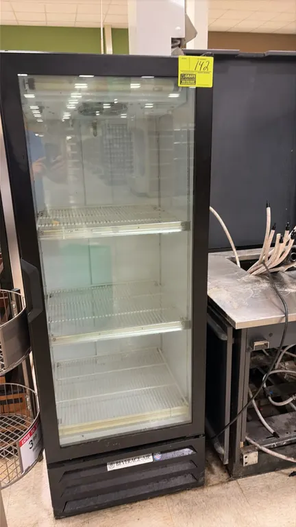 Beverage-Air LV12-1-B single glass door reach-in beverage cooler. Features black exterior, white interior, two adjustable wire shelves, and top interi