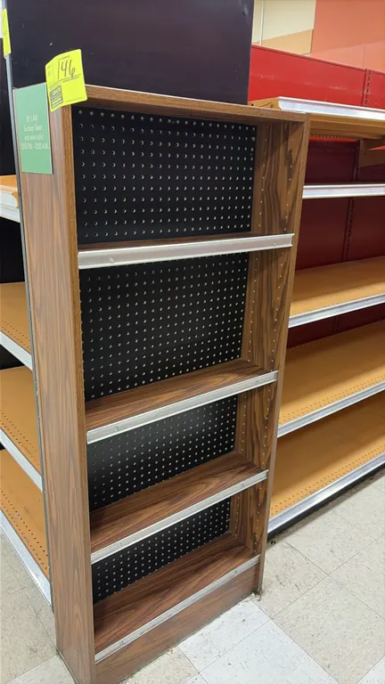 Wood laminate end cap displays. Features woodgrain laminate finish, adjustable shelving with metal ticket molding channels, and mixed solid and black