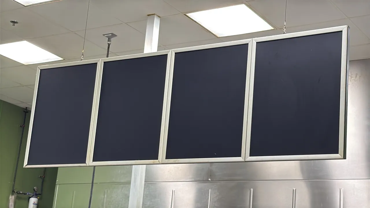 Ceiling-mount hanging menu boards. Features 4-panel display layout with metal framing. 6'L each. Designed for ceiling suspension.