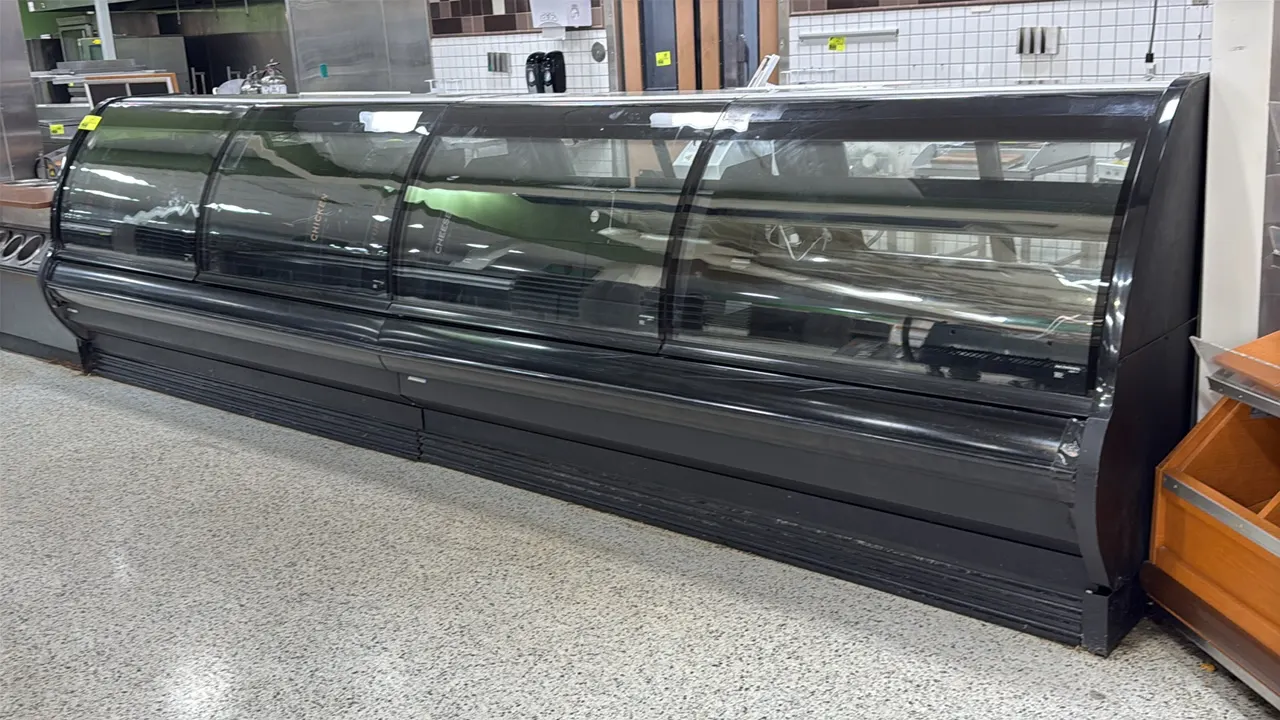 2014 Hillphoenix OSA8 remote deli service cases. Features curved glass front, rear sliding service doors, cutting board brackets, and interior lightin