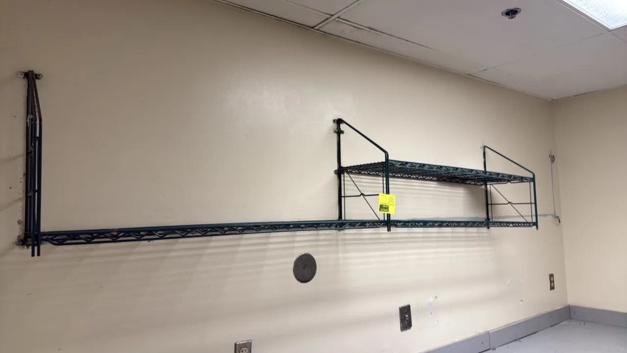 Green wire wall-mount shelves. Features green-coated metal wire construction. Includes (2) wire shelves and wall-mounting brackets. 47"L each. Wall mo