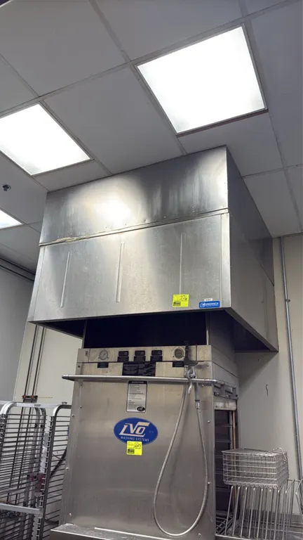 Greenheck stainless steel exhaust hood. Features stainless steel construction. 60" x 60". Ceiling mounted. Note: Pan washer, racks, and surrounding eq