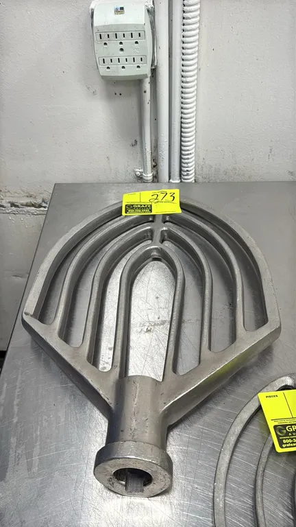 Alfa 80B 80-quart mixer paddle. Features cast aluminum flat beater construction designed for commercial planetary mixers. Other items in background no