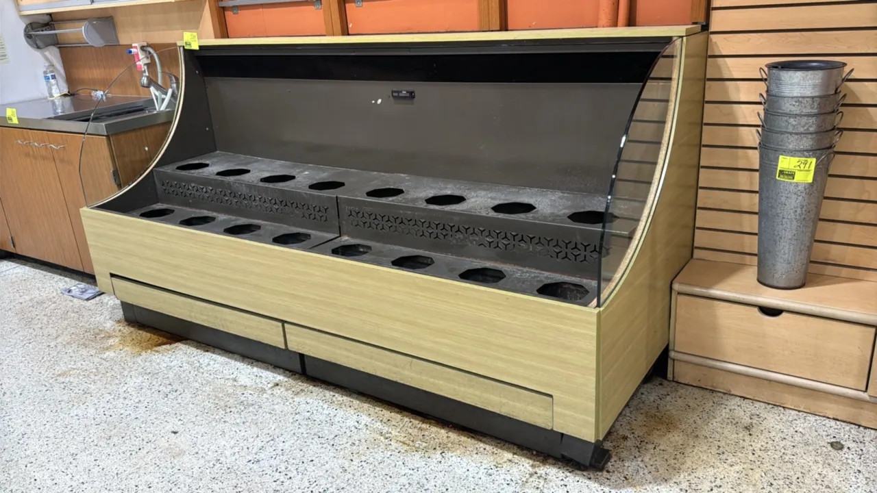 2014 Borgen Systems RR80-5276 low-profile floral display case. Features two-tier stepped rack with 16 cutouts for flower buckets, curved glass side pa