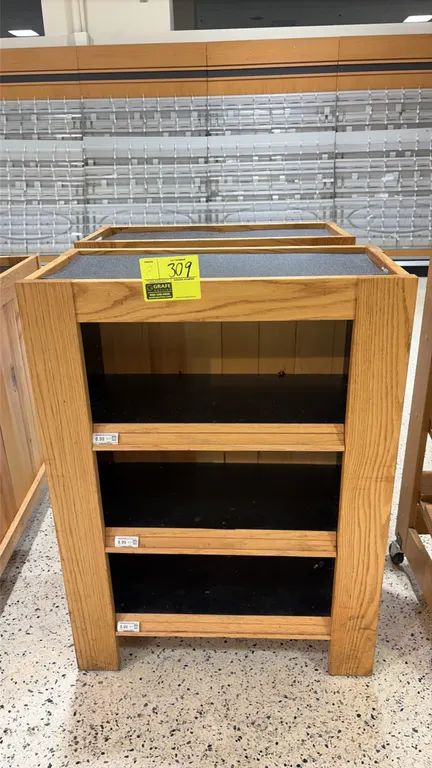 Wood produce display end caps. Features light oak wood construction, three black display shelves with integrated price tag channels, and a recessed to