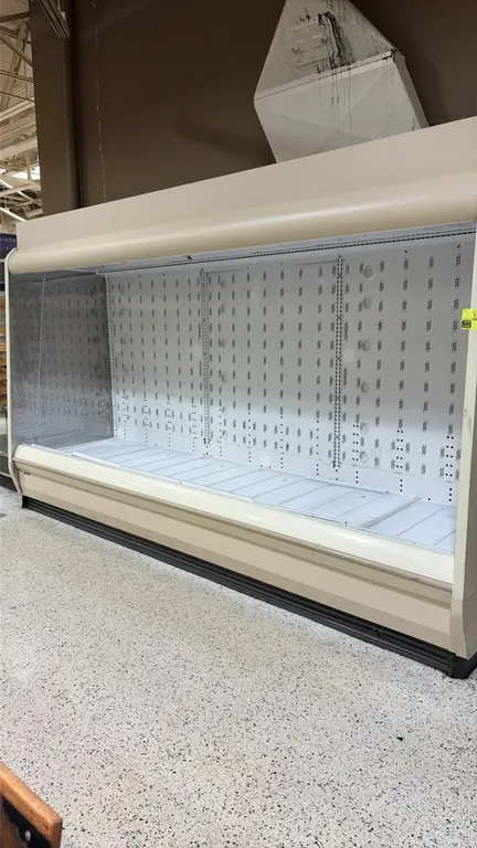 2014 Hillphoenix O5DM12 open produce display case. Features bottom wire decking and slotted back panel for adjustable shelving. 12'L. S/N: 1282131. El