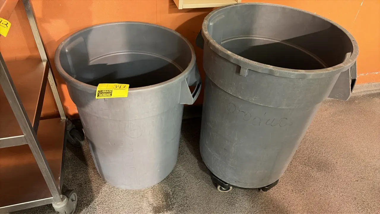 Commercial plastic trash cans. Features durable gray molded plastic construction with integrated handles. Includes (1) rolling dolly base with swivel