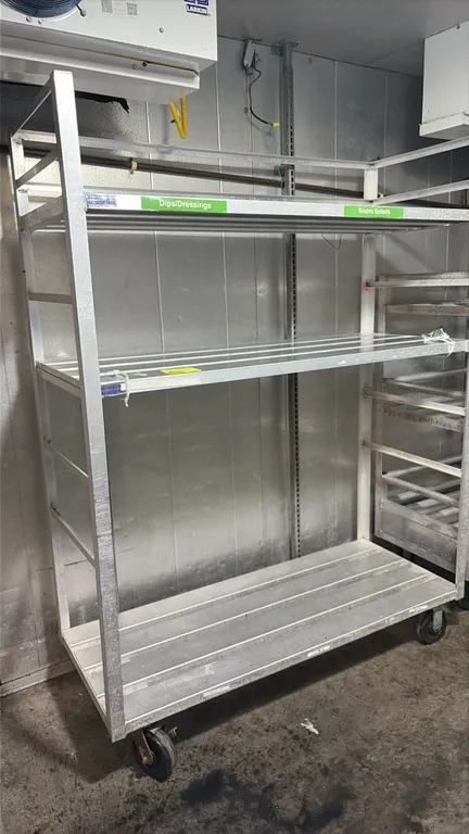 Aluminum 3-tier cart. Features all-welded aluminum construction with slatted shelving. 5'L. Mounted on swivel casters.