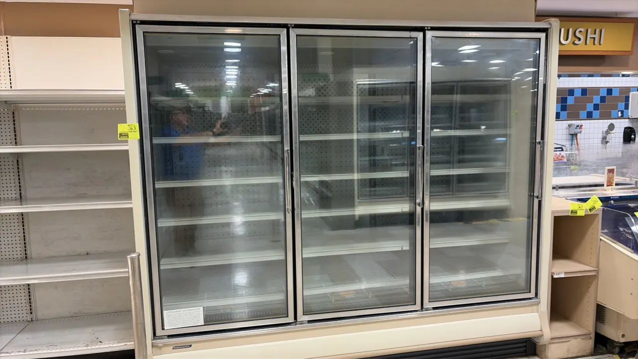 2014 Hillphoenix ORZ3 frozen food glass doors. Features gas defrost, LED interior lighting, adjustable solid shelving, and bottom wire deck racks. Ele