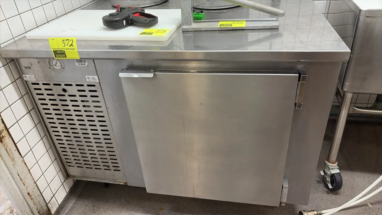 2009 Edwards Manufacturing 360-61627 stainless steel single-door reach-in cooler. Features self-contained refrigeration, flat worktop, (1) wire shelf,