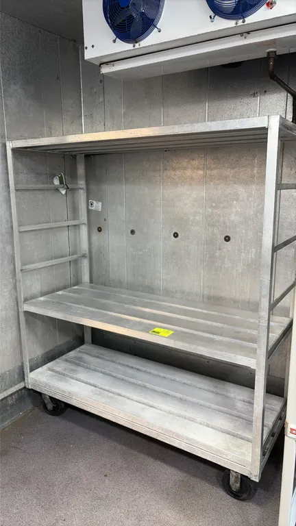 Aluminum 3-tier cart. Features slatted aluminum shelves and tubular frame construction. 5'L. Mounted on casters.