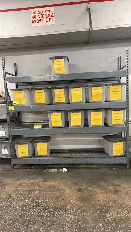 8'L of warehouse racking. Features steel frame construction, 4 shelf levels, and wire mesh decking. Dimensions: 8'L x 24"W x 8'H. Contents not include