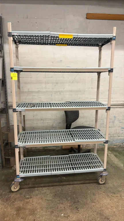 Metro MetroMax 5-tier mobile shelving rack. Features (5) adjustable tiers with vented polymer shelf mats. 4'L. Mounted on swivel casters with protecti