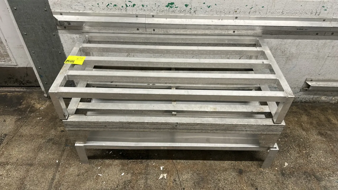Aluminum dunnage racks. Features welded tubular aluminum construction with slatted tops. 4'L x 2'W each.