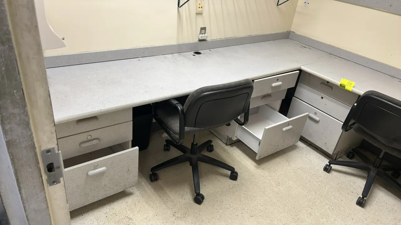 L-shaped laminate office desk suite with chairs and room contents. Includes 92" x 110" L-shaped desk with multiple drawer pedestals, (2) upholstered s