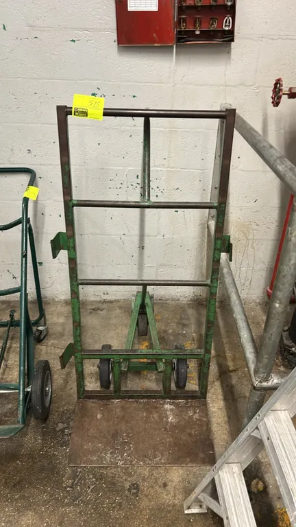 Greenlee hand truck wire cart. Features steel frame construction, an extended toe plate, side spindle brackets, and a rear folding caster support fram