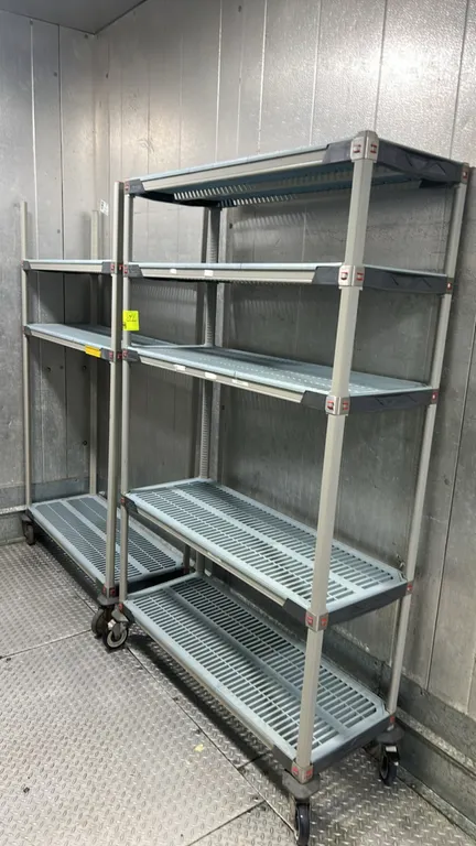 Metro MetroMax polymer mobile shelving units. Features adjustable tiers with vented polymer grid shelf mats. 48" x 18". Mounted on swivel casters.