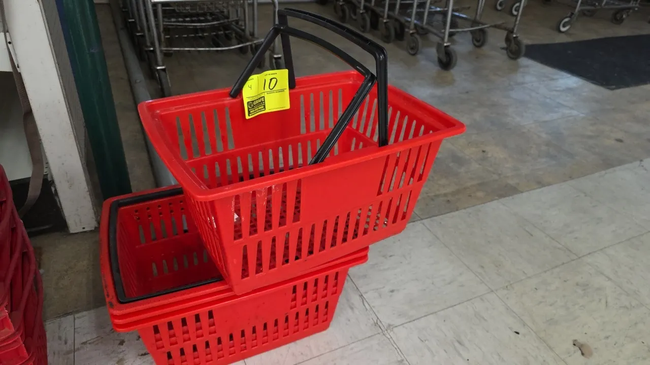 Poly shopping baskets. Features molded red plastic construction and dual black folding handles. Dimensions: 18" x 13" x 9".