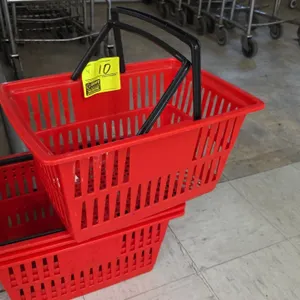 Poly shopping baskets. Features molded red plastic construction and dual black folding handles. Dimensions: 18" x 13" x 9".